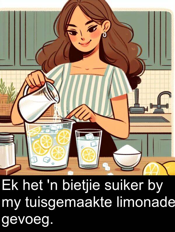 limonade: Ek het 'n bietjie suiker by my tuisgemaakte limonade gevoeg.