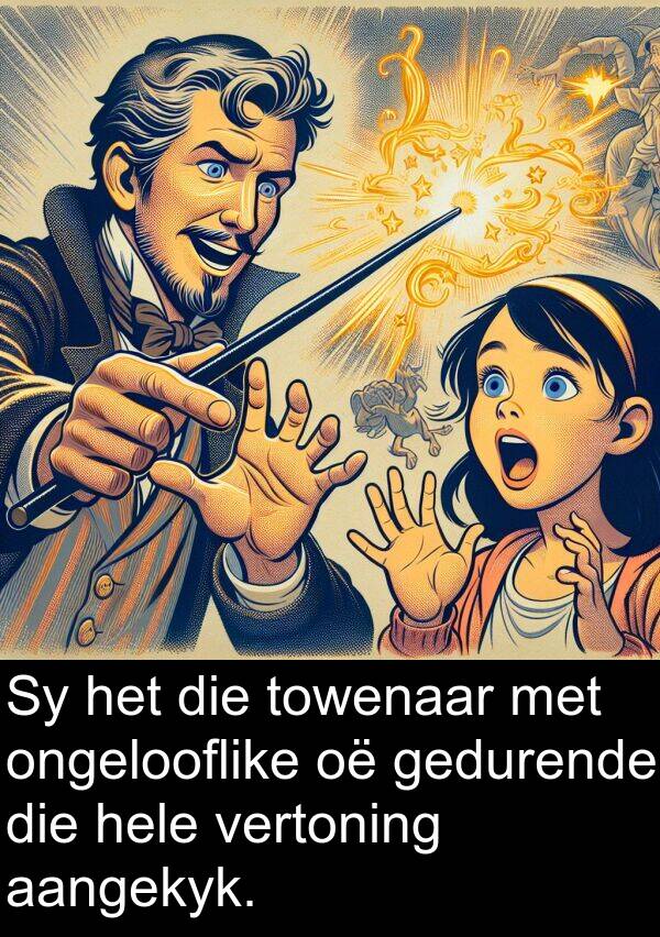 hele: Sy het die towenaar met ongelooflike oë gedurende die hele vertoning aangekyk.