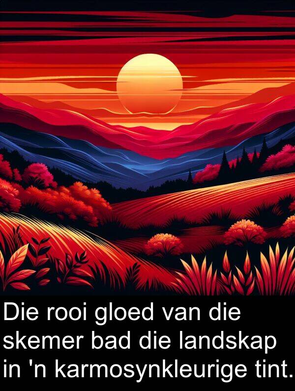 bad: Die rooi gloed van die skemer bad die landskap in 'n karmosynkleurige tint.