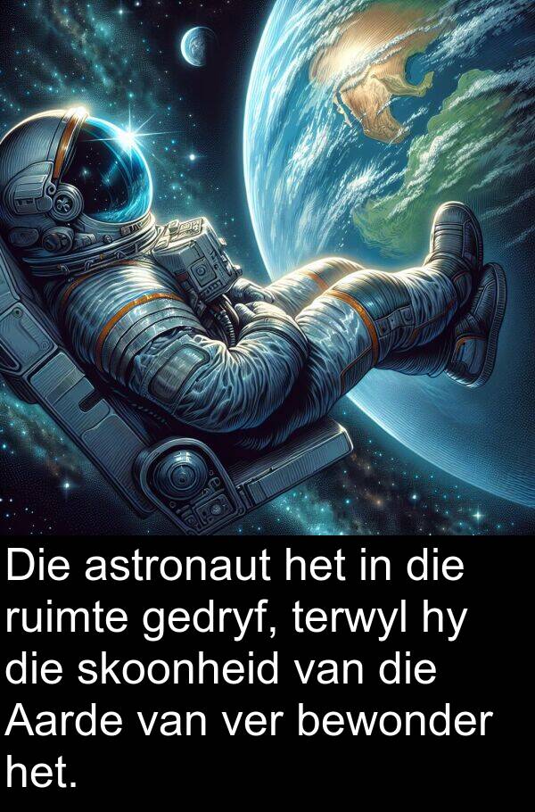 gedryf: Die astronaut het in die ruimte gedryf, terwyl hy die skoonheid van die Aarde van ver bewonder het.