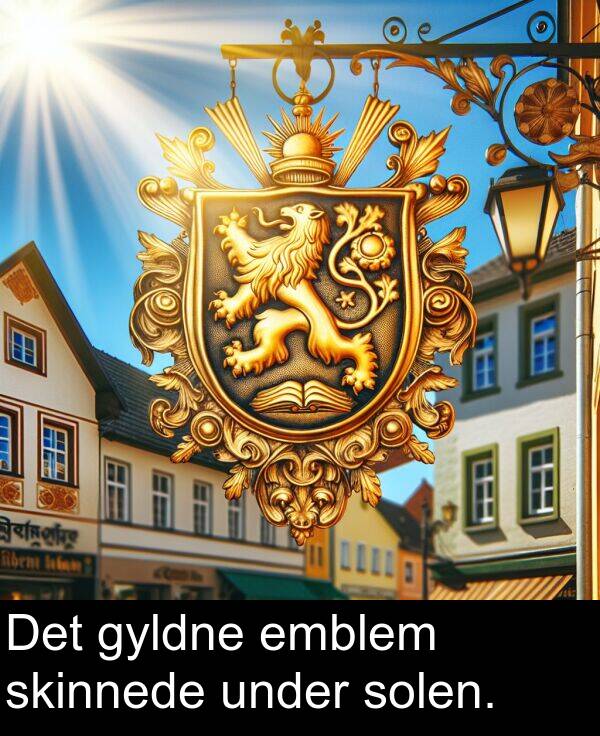 emblem: Det gyldne emblem skinnede under solen.