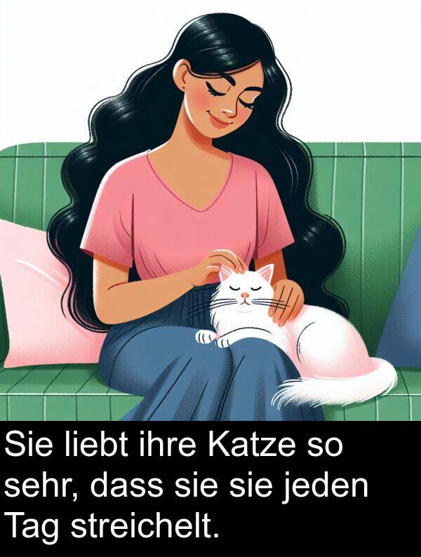 Katze: Sie liebt ihre Katze so sehr, dass sie sie jeden Tag streichelt.