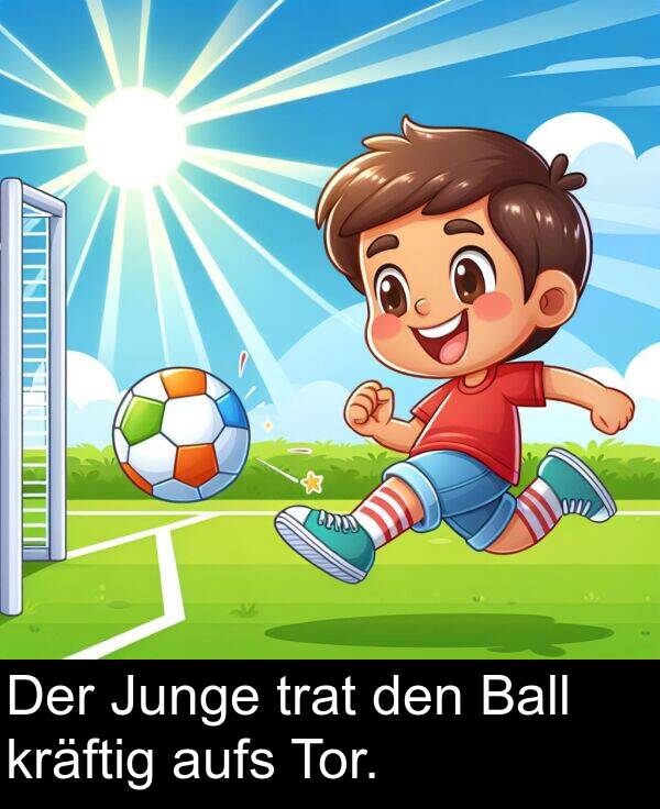 Junge: Der Junge trat den Ball kräftig aufs Tor.