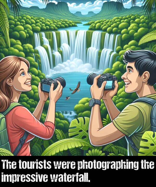 were: The tourists were photographing the impressive waterfall.