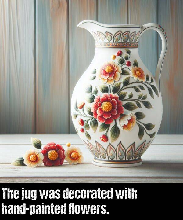 decorated: The jug was decorated with hand-painted flowers.