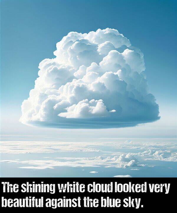 blue: The shining white cloud looked very beautiful against the blue sky.