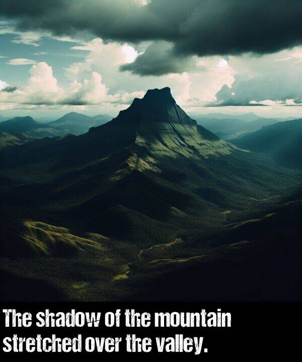 shadow: The shadow of the mountain stretched over the valley.