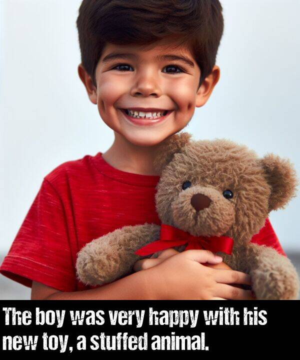 new: The boy was very happy with his new toy, a stuffed animal.