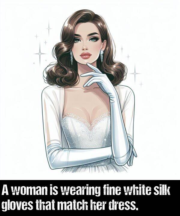 dress: A woman is wearing fine white silk gloves that match her dress.