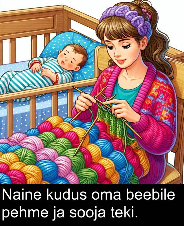 pehme: Naine kudus oma beebile pehme ja sooja teki.