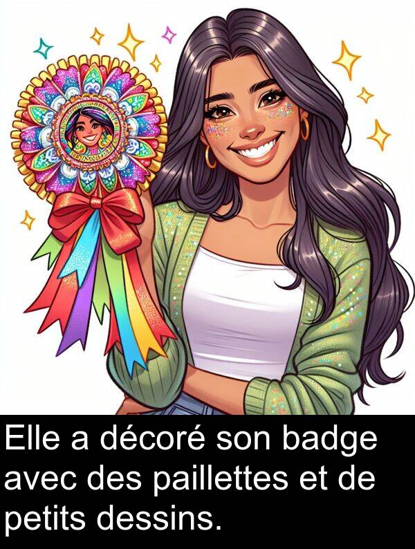 petits: Elle a décoré son badge avec des paillettes et de petits dessins.