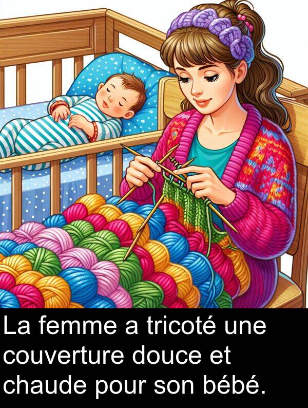 tricoté: La femme a tricoté une couverture douce et chaude pour son bébé.