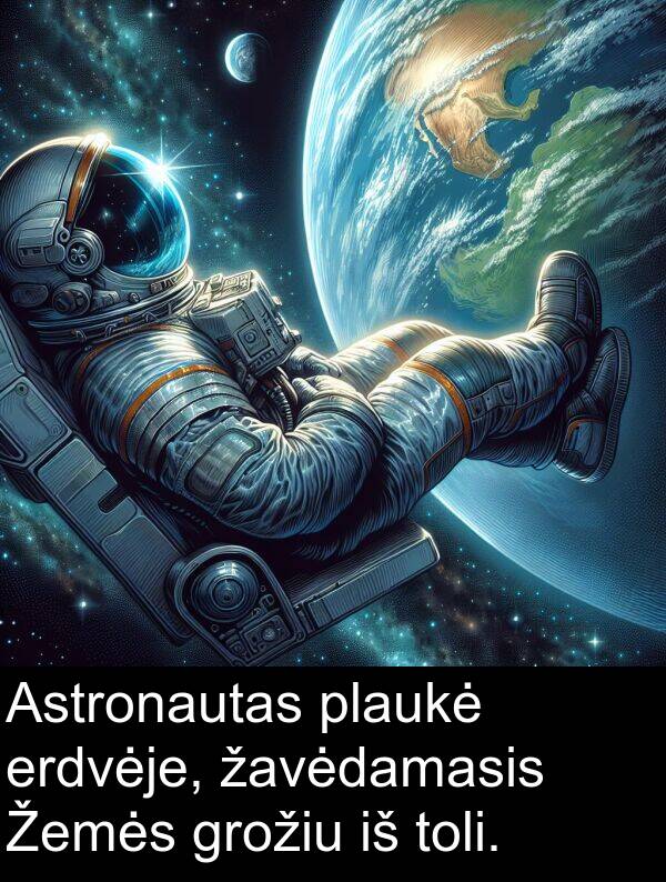 žavėdamasis: Astronautas plaukė erdvėje, žavėdamasis Žemės grožiu iš toli.