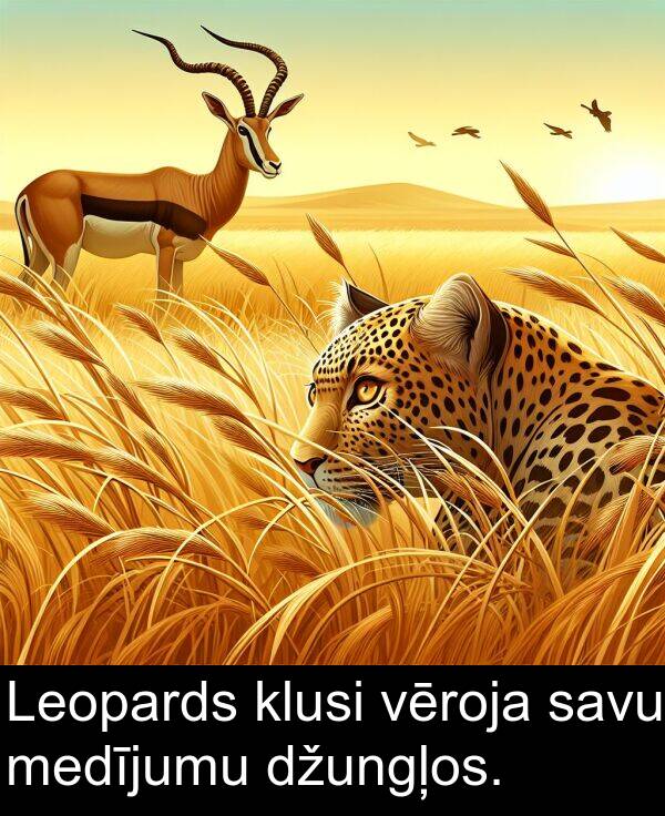 medījumu: Leopards klusi vēroja savu medījumu džungļos.