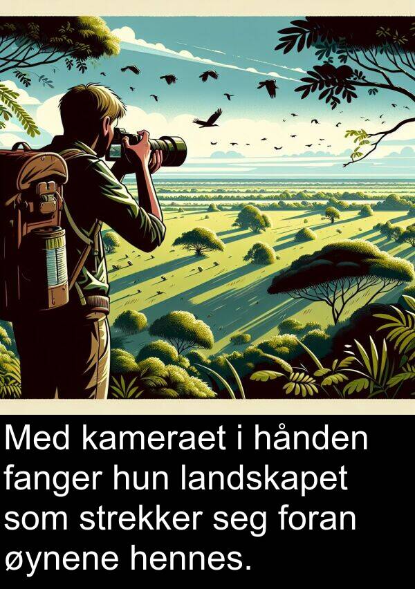 hånden: Med kameraet i hånden fanger hun landskapet som strekker seg foran øynene hennes.