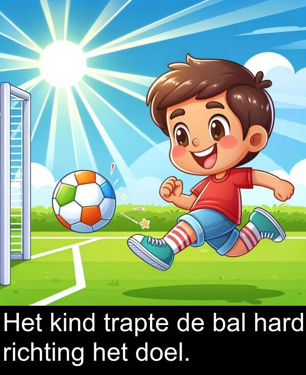 richting: Het kind trapte de bal hard richting het doel.