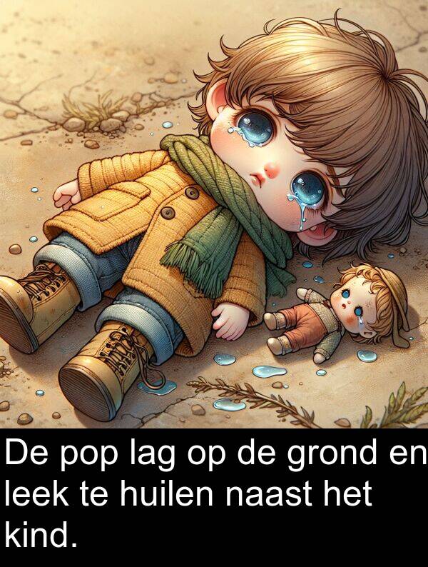 pop: De pop lag op de grond en leek te huilen naast het kind.