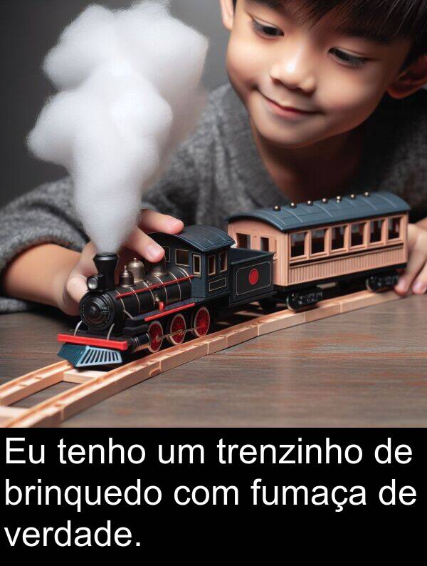 tenho: Eu tenho um trenzinho de brinquedo com fumaça de verdade.