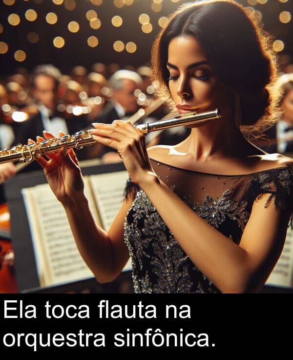 toca: Ela toca flauta na orquestra sinfônica.