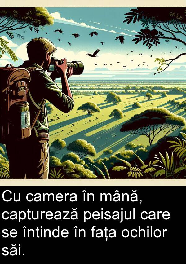 săi: Cu camera în mână, capturează peisajul care se întinde în fața ochilor săi.