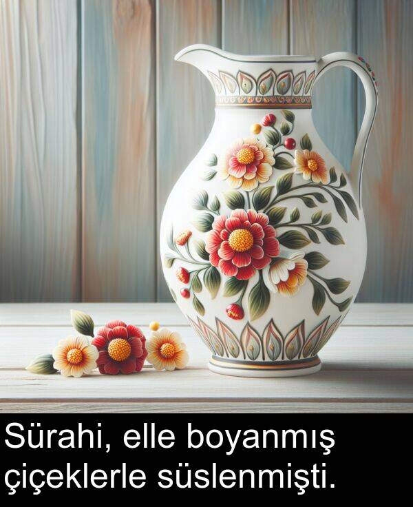 elle: Sürahi, elle boyanmış çiçeklerle süslenmişti.