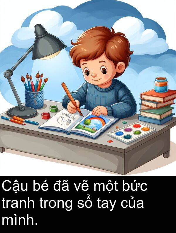 tranh: Cậu bé đã vẽ một bức tranh trong sổ tay của mình.