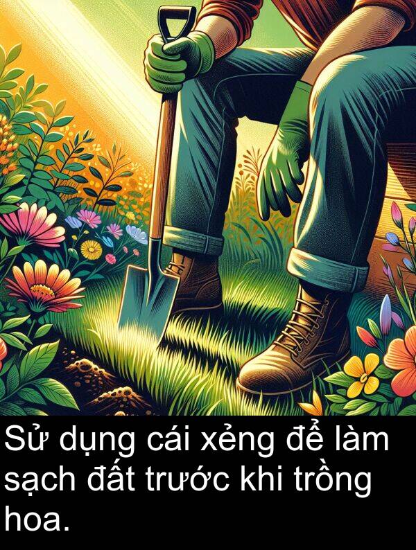 trồng: Sử dụng cái xẻng để làm sạch đất trước khi trồng hoa.