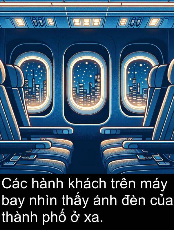 xa: Các hành khách trên máy bay nhìn thấy ánh đèn của thành phố ở xa.