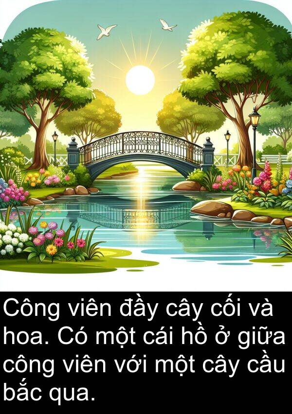 cối: Công viên đầy cây cối và hoa. Có một cái hồ ở giữa công viên với một cây cầu bắc qua.