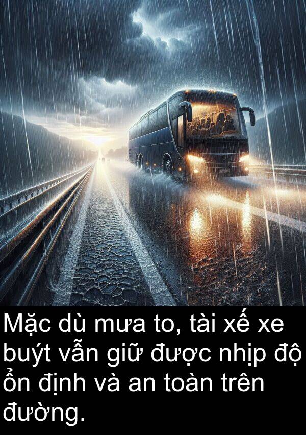 to: Mặc dù mưa to, tài xế xe buýt vẫn giữ được nhịp độ ổn định và an toàn trên đường.