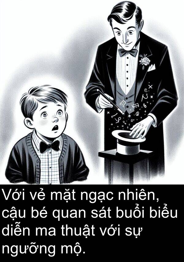 cậu: Với vẻ mặt ngạc nhiên, cậu bé quan sát buổi biểu diễn ma thuật với sự ngưỡng mộ.