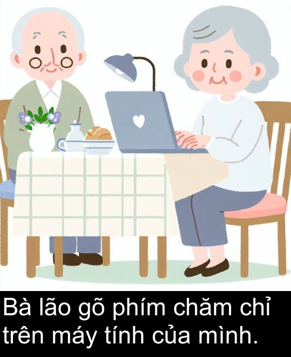 chỉ: Bà lão gõ phím chăm chỉ trên máy tính của mình.